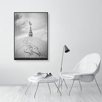 Black and white photograph of a domed rooftop adorned with Arabic calligraphy and topped by a crescent and star finial. The textured surface and cloudy sky create a calm, spiritual atmosphere emphasizing form and symbolism.