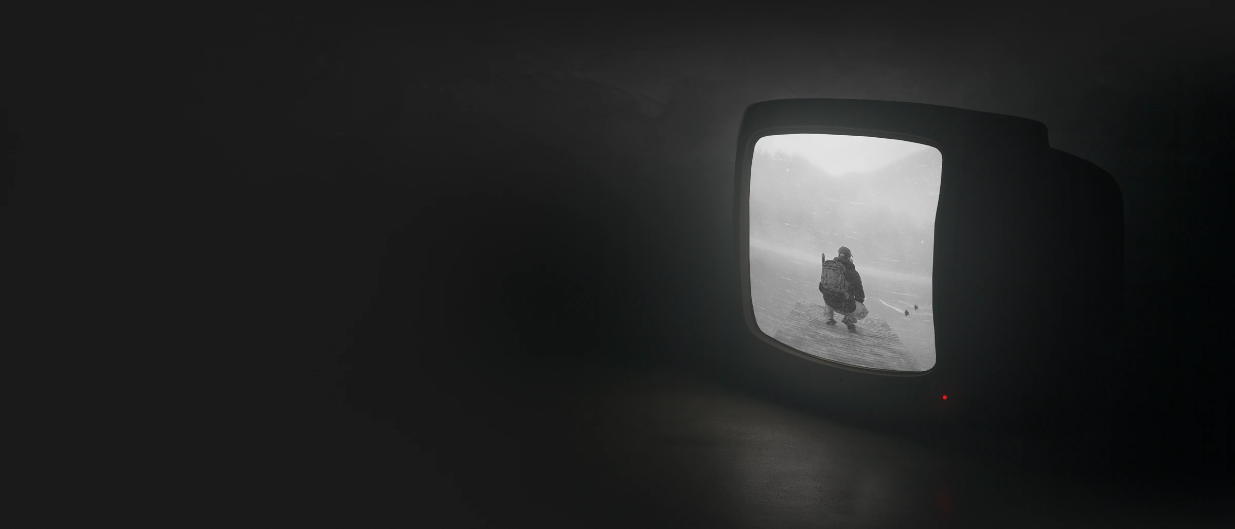 Dark, minimalist scene featuring a vintage TV softly illuminating the floor. A subtle visual cue for the channel’s launch in the Dustlight style.